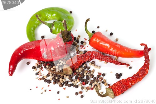 Image of Mix of hot peppers on white background