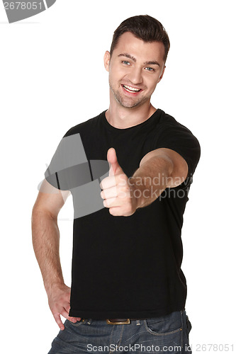 Image of Happy man giving thumbs up sign