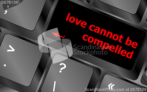 Image of love cannot be compelled words showing romance and love on keyboard keys