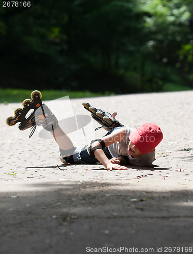 Image of Little rollerblader takes a tumble