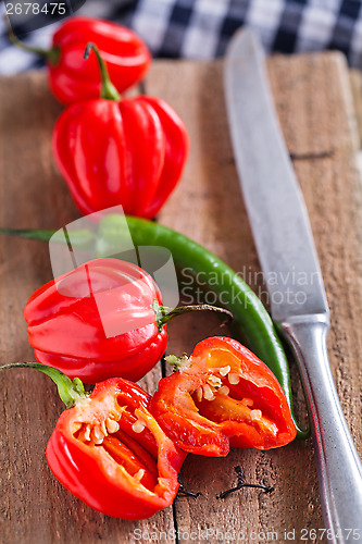 Image of Red and green chili peppers