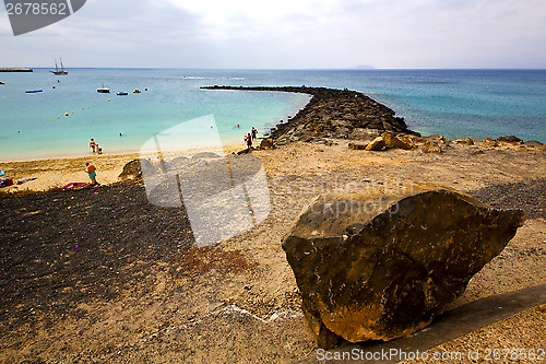 Image of surf yacht pier  water  boat coastline and summer  lanzarote spa