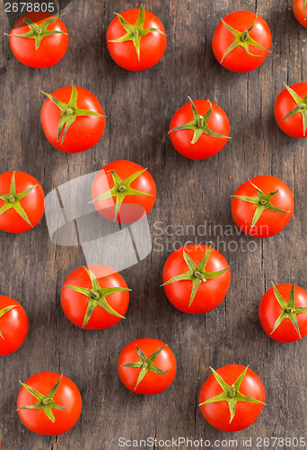 Image of cherry tomatoes on vintage wooden table