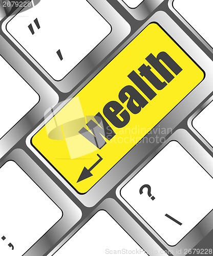 Image of cloud icon with wealth word on computer keyboard key