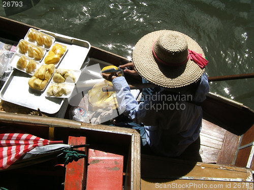 Image of Woman at Thai floating market