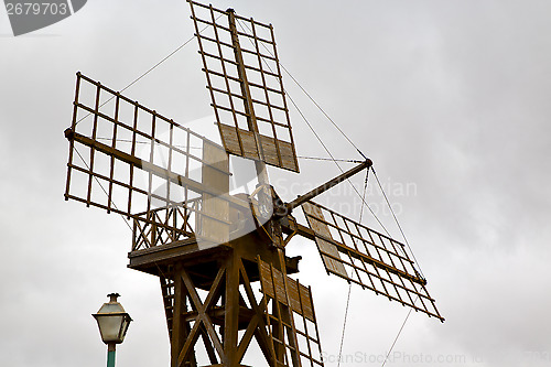 Image of hole windmills lanzarote africa spain   and the sky 