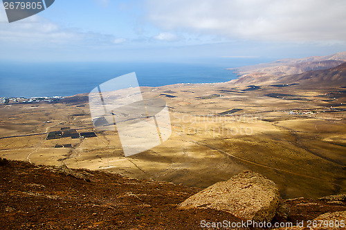 Image of coastline  top in  spain africa and house field 