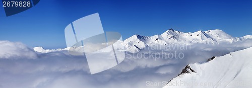 Image of Panorama of mountains under clouds at nice day