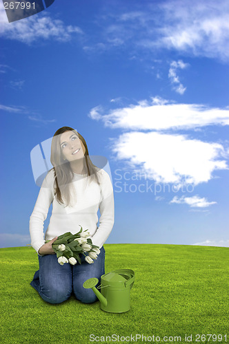 Image of Beautiful woman with tulips
