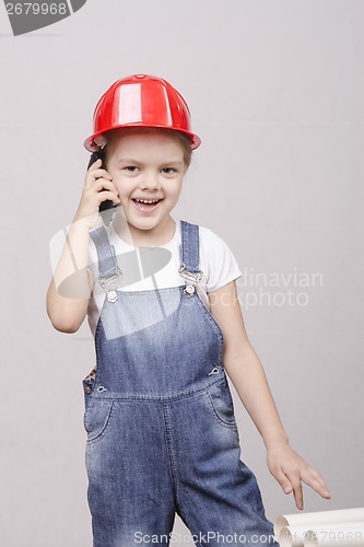 Image of child Builder talking on the phone