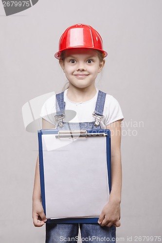 Image of child in helmet advertises inscription on sheet