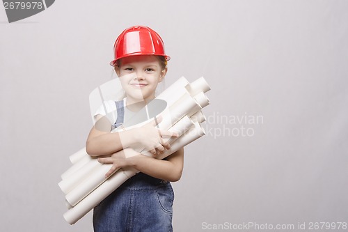 Image of Girl stands with a bunch of drawings