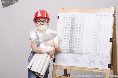 Image of child glasses helmet stands with drawings of Board
