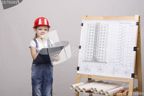 Image of Girl architect is drawing near