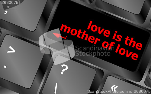 Image of computer keyboard with words love is the mother of love