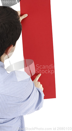 Image of Man holding a paper