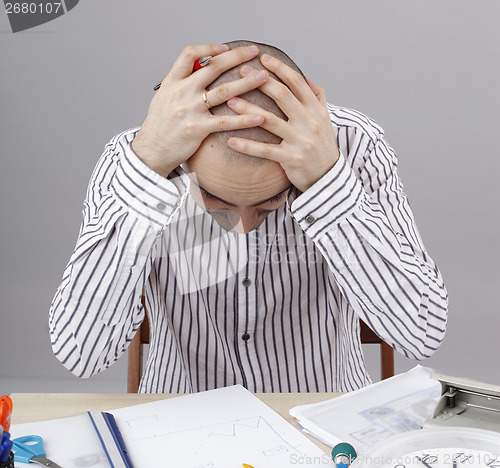 Image of Man at desk