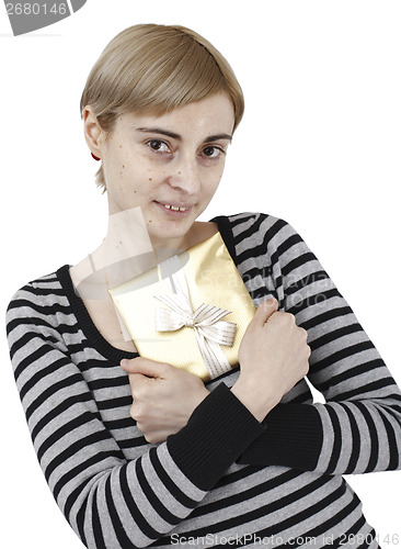 Image of Young woman holding a present