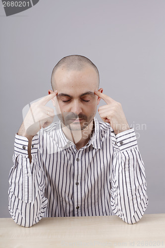 Image of Man at desk