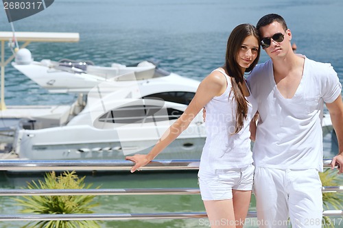 Image of young couple on yacht