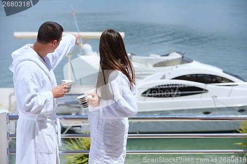 Image of young couple on yacht