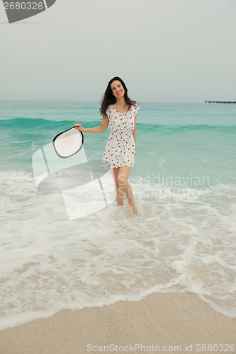 Image of Happy Beautiful Woman Enjoying Summer Vacation
