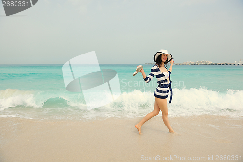 Image of Happy Beautiful Woman Enjoying Summer Vacation