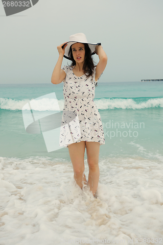 Image of Happy Beautiful Woman Enjoying Summer Vacation