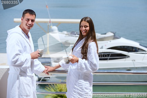 Image of young couple on yacht