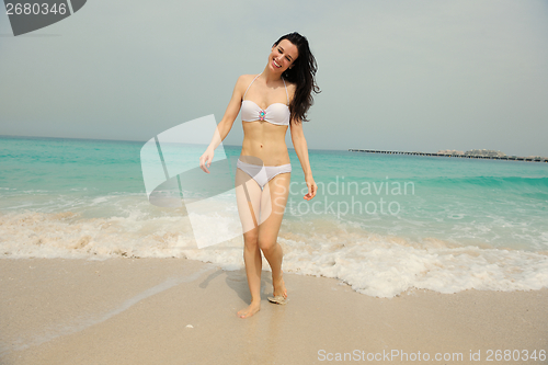 Image of Happy Beautiful Woman Enjoying Summer Vacation