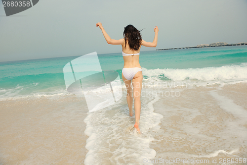 Image of Happy Beautiful Woman Enjoying Summer Vacation