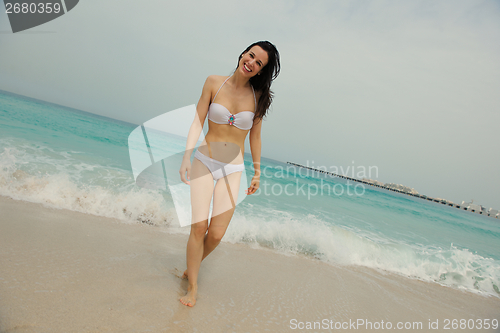 Image of Happy Beautiful Woman Enjoying Summer Vacation