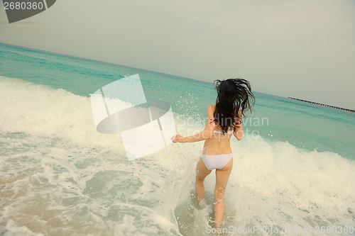Image of Happy Beautiful Woman Enjoying Summer Vacation