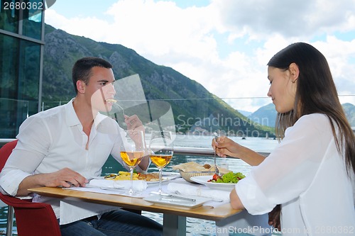 Image of couple having lanch at beautiful restaurant