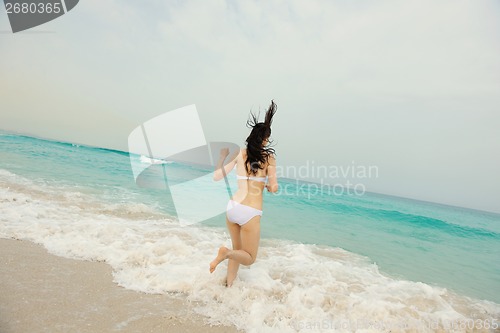 Image of Happy Beautiful Woman Enjoying Summer Vacation