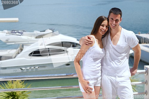 Image of young couple on yacht