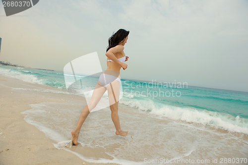 Image of Happy Beautiful Woman Enjoying Summer Vacation