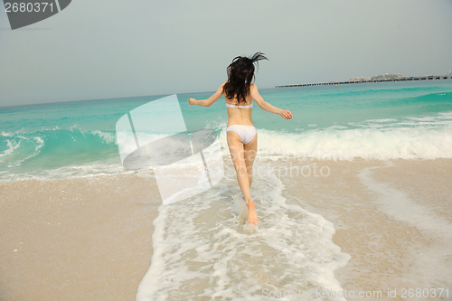 Image of Happy Beautiful Woman Enjoying Summer Vacation