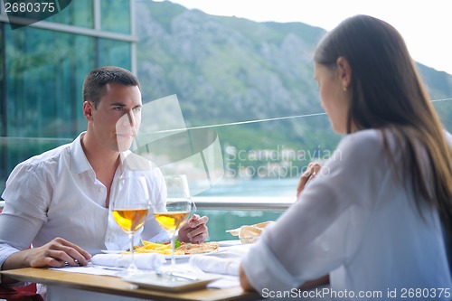 Image of couple having lanch at beautiful restaurant