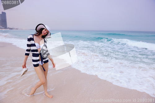 Image of Happy Beautiful Woman Enjoying Summer Vacation