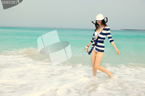 Image of Happy Beautiful Woman Enjoying Summer Vacation