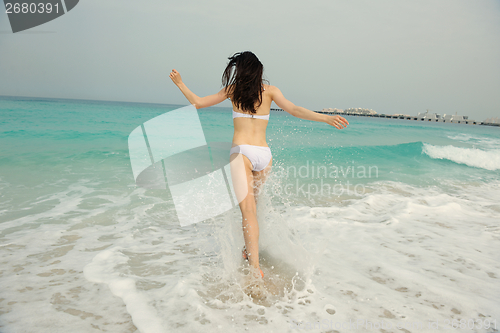 Image of Happy Beautiful Woman Enjoying Summer Vacation