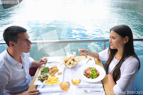 Image of couple having lanch at beautiful restaurant