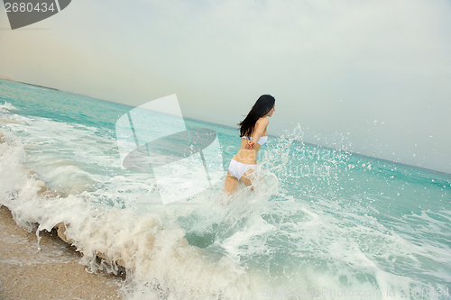 Image of Happy Beautiful Woman Enjoying Summer Vacation