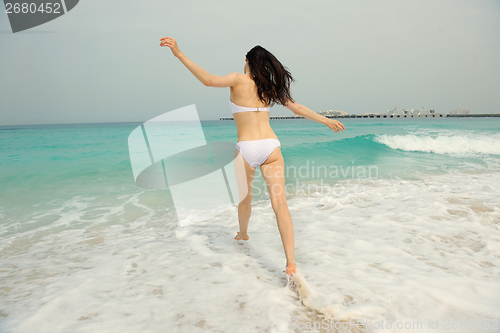 Image of Happy Beautiful Woman Enjoying Summer Vacation