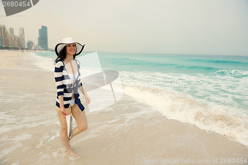 Image of Happy Beautiful Woman Enjoying Summer Vacation