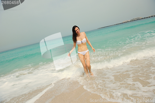 Image of Happy Beautiful Woman Enjoying Summer Vacation