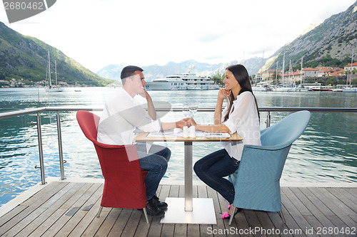 Image of couple having lanch at beautiful restaurant