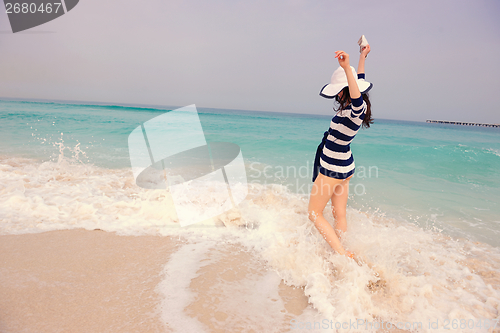Image of Happy Beautiful Woman Enjoying Summer Vacation