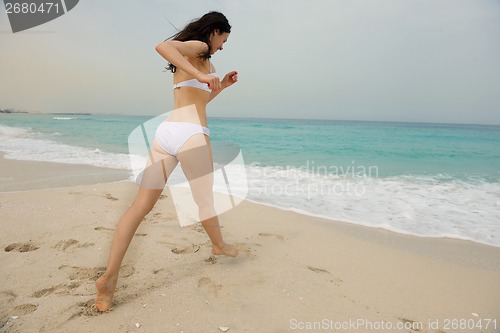 Image of Happy Beautiful Woman Enjoying Summer Vacation